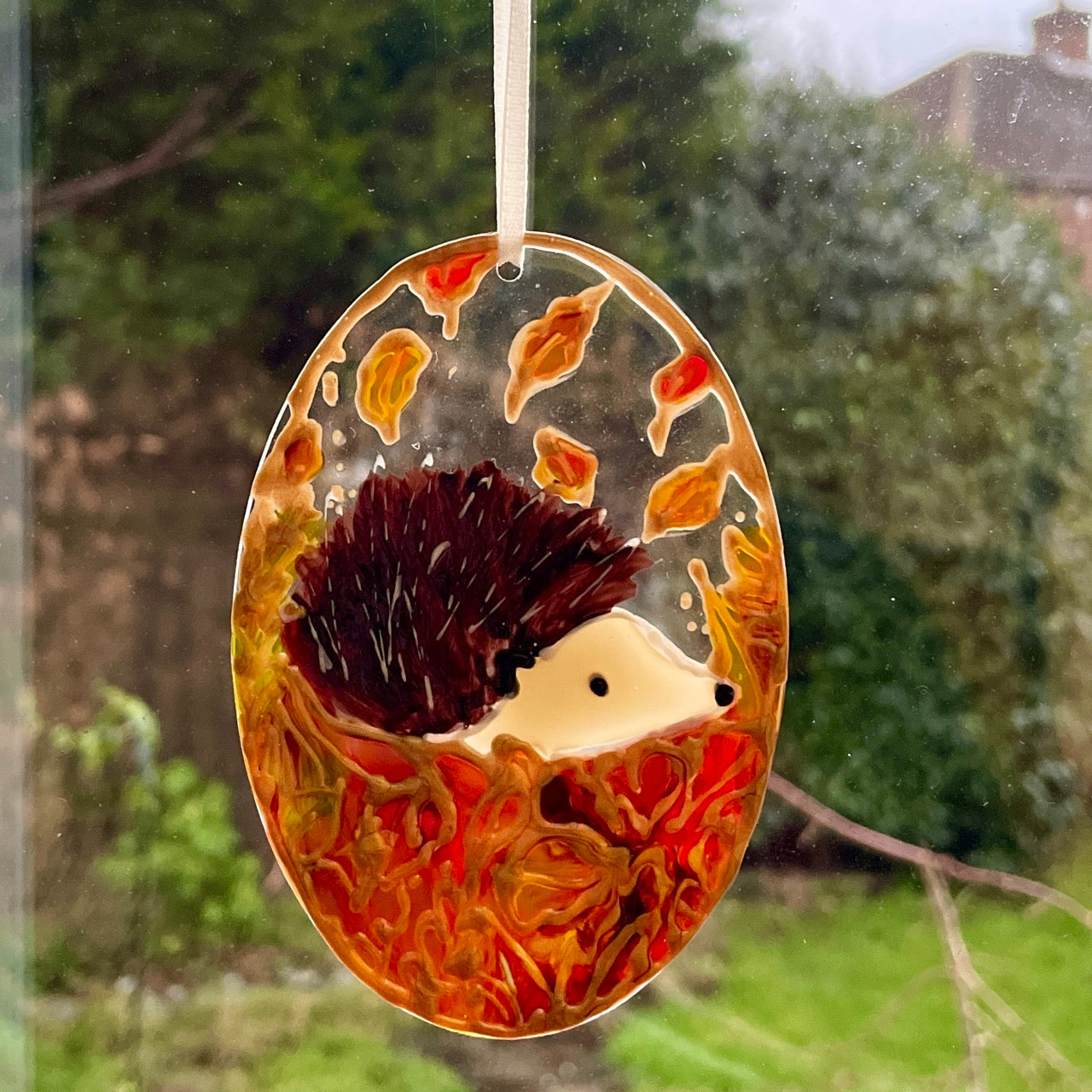 Hedgehog in autumn~ Oval suncatcher