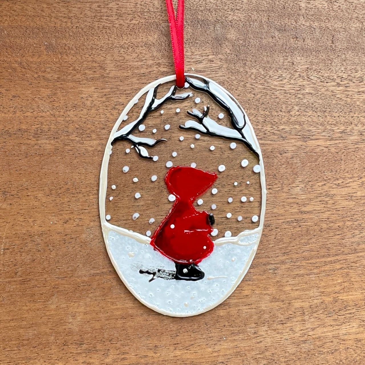 Redhood in snow~ Oval suncatcher