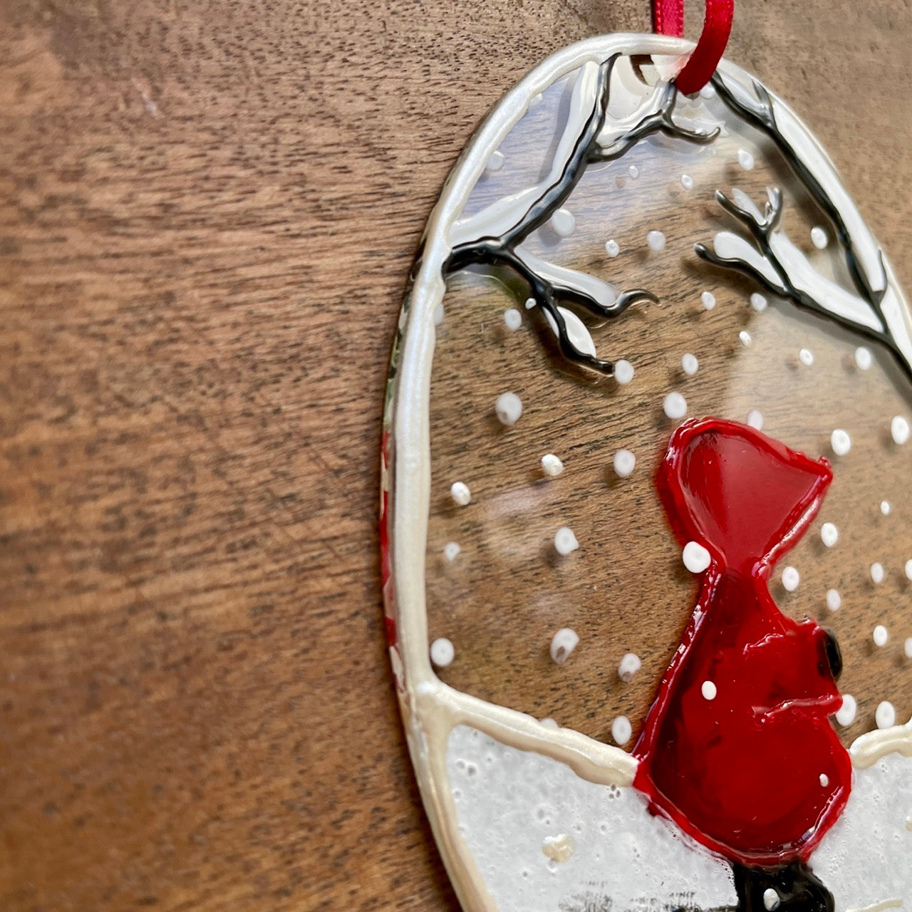 Redhood in snow~ Oval suncatcher