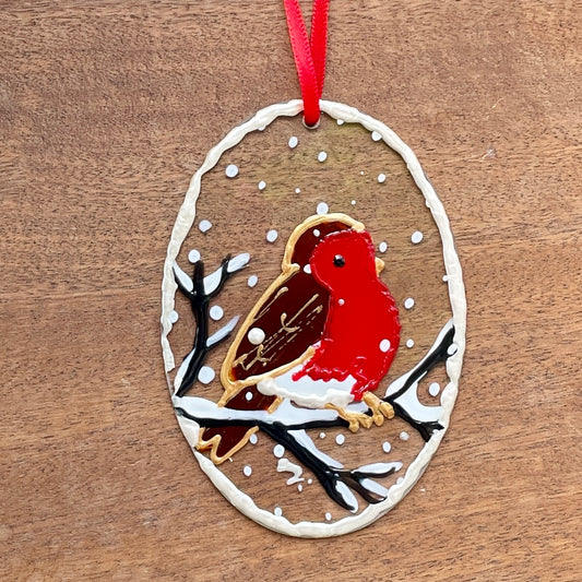 Robin in snow~ Oval suncatcher