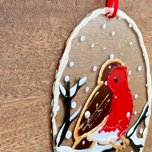 Robin in snow~ Oval suncatcher